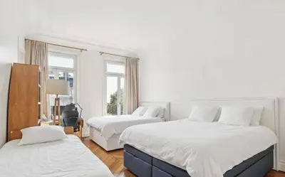 Un ou plusieurs lits dans un hébergement de l'établissement Superbe Appartements Tour Eiffel View Champs de Mars