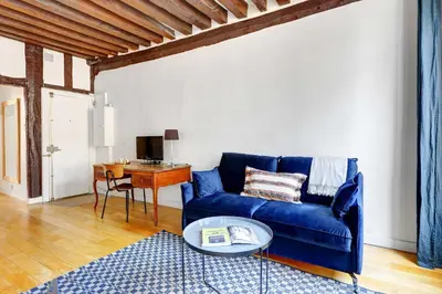 Coin salon dans l'établissement BnBNova - 1BR - Saint-Germain & Luxembourg