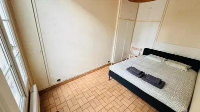 Un ou plusieurs lits dans un hébergement de l'établissement 2-bed apart close to Louvre