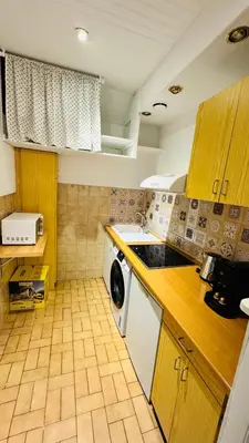 Cuisine ou kitchenette dans l'établissement 2-bed apart close to Louvre