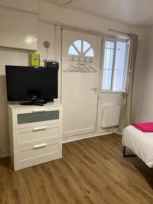 Télévision ou salle de divertissement dans l'établissement Appartement paris 15