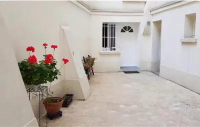 Un ou plusieurs lits dans un hébergement de l'établissement Appartement paris 15