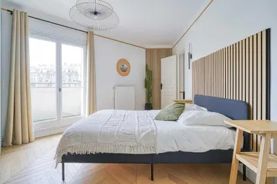Un ou plusieurs lits dans un hébergement de l'établissement Bright flat - 3BR - 6P - Ternes