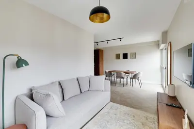 Coin salon dans l'établissement Spacious Apartment 1BR 2P - Nation