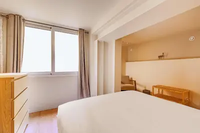 Un ou plusieurs lits dans un hébergement de l'établissement Modern apartment - 1BR - 4P terrace - Invalides