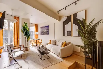 Coin salon dans l'établissement Modern apartment - 1BR - 4P terrace - Invalides