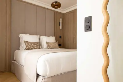 Un ou plusieurs lits dans un hébergement de l'établissement Design Apartment a c 3BR 8P - Notre Dame