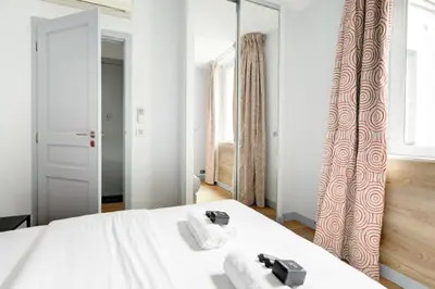 Un ou plusieurs lits dans un hébergement de l'établissement Ecrin Design - 2BR Climatise et Equipe