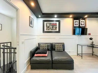 Coin salon dans l'établissement UrbanFlat 55 - Marylin Monroe Flat in Parisian Historic Passage