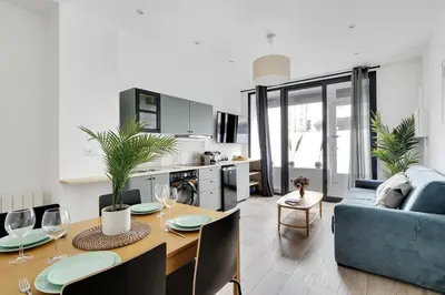 Coin salon dans l'établissement Sublime appartement 6P