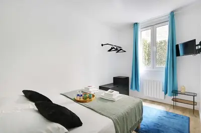 Un ou plusieurs lits dans un hébergement de l'établissement Sublime appartement 6P