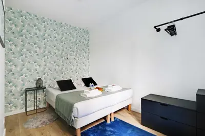 Un ou plusieurs lits dans un hébergement de l'établissement Sublime appartement 6P