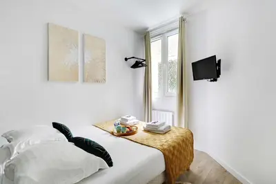 Télévision ou salle de divertissement dans l'établissement Sublime appartement 6P