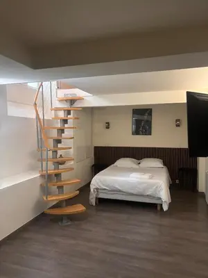 Un ou plusieurs lits dans un hébergement de l'établissement Cozy Apartment - Boulogne-Billancourt