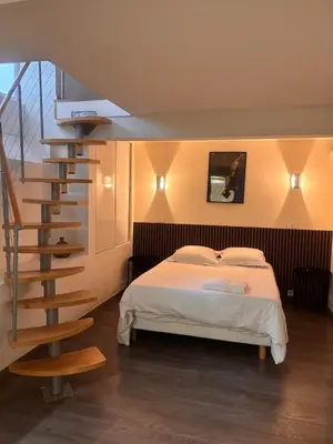 Un ou plusieurs lits dans un hébergement de l'établissement Cozy Apartment - Boulogne-Billancourt