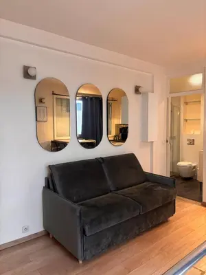 Coin salon dans l'établissement Cozy Apartment - Boulogne-Billancourt