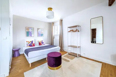 Un ou plusieurs lits dans un hébergement de l'établissement Charming Fully Equipped Studio near Mairie d'Issy