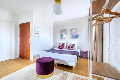 Un ou plusieurs lits dans un hébergement de l'établissement Charming Fully Equipped Studio near Mairie d'Issy
