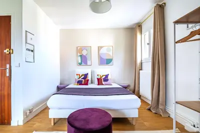 Un ou plusieurs lits dans un hébergement de l'établissement Charming Fully Equipped Studio near Mairie d'Issy
