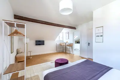 Un ou plusieurs lits dans un hébergement de l'établissement Charming Fully Equipped Studio near Mairie d'Issy