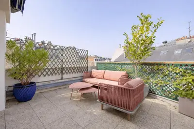 Balcon ou terrasse dans l'établissement Cocon avec vue sur la Tour Eiffel