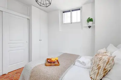 Un ou plusieurs lits dans un hébergement de l'établissement Serenty - Bright 1BR Near Bastille & Marais