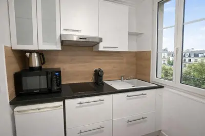 Cuisine ou kitchenette dans l'établissement Studio Parisien grands boulevards Couple ou Solo