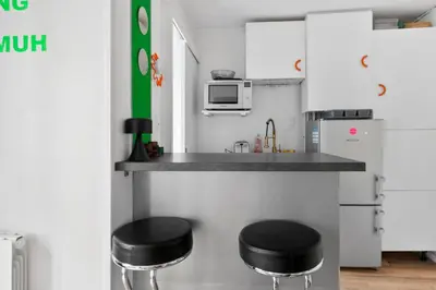 Cuisine ou kitchenette dans l'établissement Studio design lumineux au cœur du 11e – Bastille