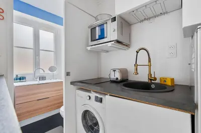 Cuisine ou kitchenette dans l'établissement Studio design lumineux au cœur du 11e – Bastille