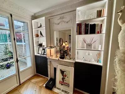 Cuisine ou kitchenette dans l'établissement Bel appartement meublé Art Déco 2 terrasses