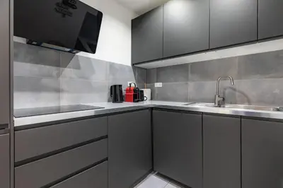Cuisine ou kitchenette dans l'établissement Beautiful chic 5-room apartment in Marais & Bastille on foot