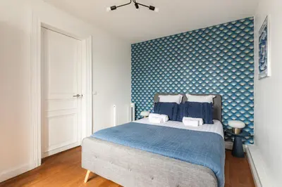 Un ou plusieurs lits dans un hébergement de l'établissement Beautiful chic 5-room apartment in Marais & Bastille on foot