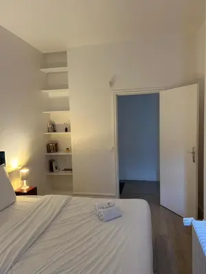 Un ou plusieurs lits dans un hébergement de l'établissement Appartement familial - Porte Versailles
