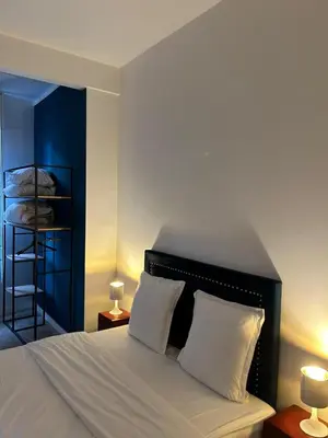 Un ou plusieurs lits dans un hébergement de l'établissement Appartement familial - Porte Versailles