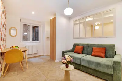Coin salon dans l'établissement Appartement Cosy Faubourg Saint-Denis 4P