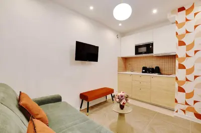 Télévision ou salle de divertissement dans l'établissement Appartement Cosy Faubourg Saint-Denis 4P