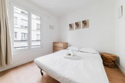 Un ou plusieurs lits dans un hébergement de l'établissement Paris 18eme Appartement Calme Cosy a Montmartre