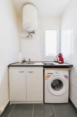 Cuisine ou kitchenette dans l'établissement Paris 18eme Appartement Calme Cosy a Montmartre
