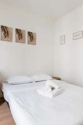 Un ou plusieurs lits dans un hébergement de l'établissement Paris 18eme Appartement Calme Cosy a Montmartre