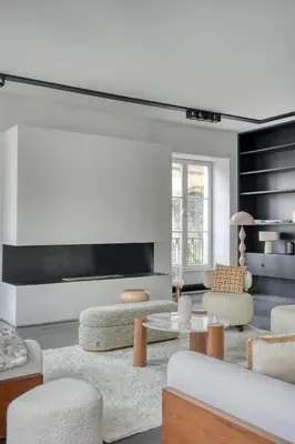 Coin salon dans l'établissement Appartement des Victoires Luxury