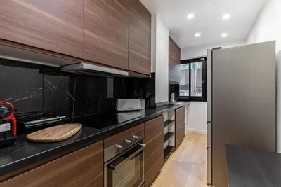 Cuisine ou kitchenette dans l'établissement sublime appartement avec terasse
