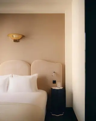 Un ou plusieurs lits dans un hébergement de l'établissement Pied A Terre Madeleine