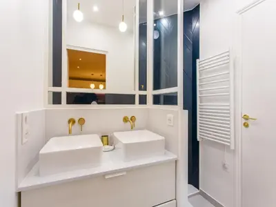 Salle de bains dans l'établissement Beautiful apartment - 4BR 10P - Rue des Martyrs