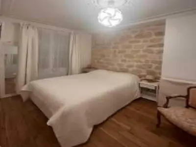 Un ou plusieurs lits dans un hébergement de l'établissement Modern 1BDR apt near Moulin Rouge Montmartre