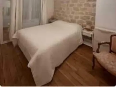 Un ou plusieurs lits dans un hébergement de l'établissement Modern 1BDR apt near Moulin Rouge Montmartre