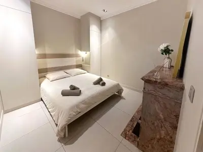 Un ou plusieurs lits dans un hébergement de l'établissement Le Flandrin Large apartment in Paris 16th