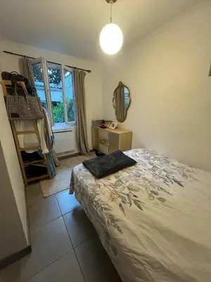 Un ou plusieurs lits dans un hébergement de l'établissement Apartment and private courtyard