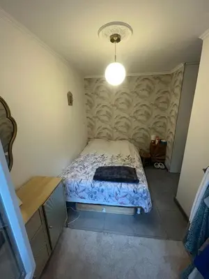 Un ou plusieurs lits dans un hébergement de l'établissement Apartment and private courtyard