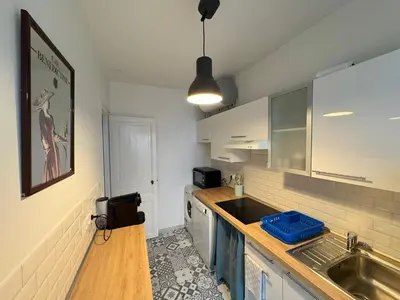 Cuisine ou kitchenette dans l'établissement Le Cocon Lumineux Parisien - Check-in H24