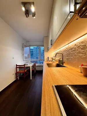 Cuisine ou kitchenette dans l'établissement Paris View Direct Access Apartment 10 people